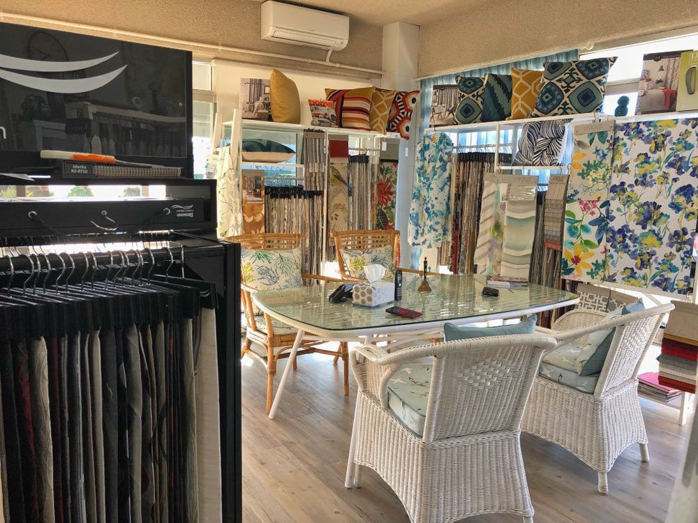 A Room with A Table and Chairs in It — Artizen Curtains in Mooloolaba, QLD