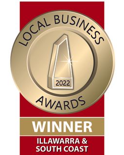 A gold badge that says local business awards winner illawarra & south coast