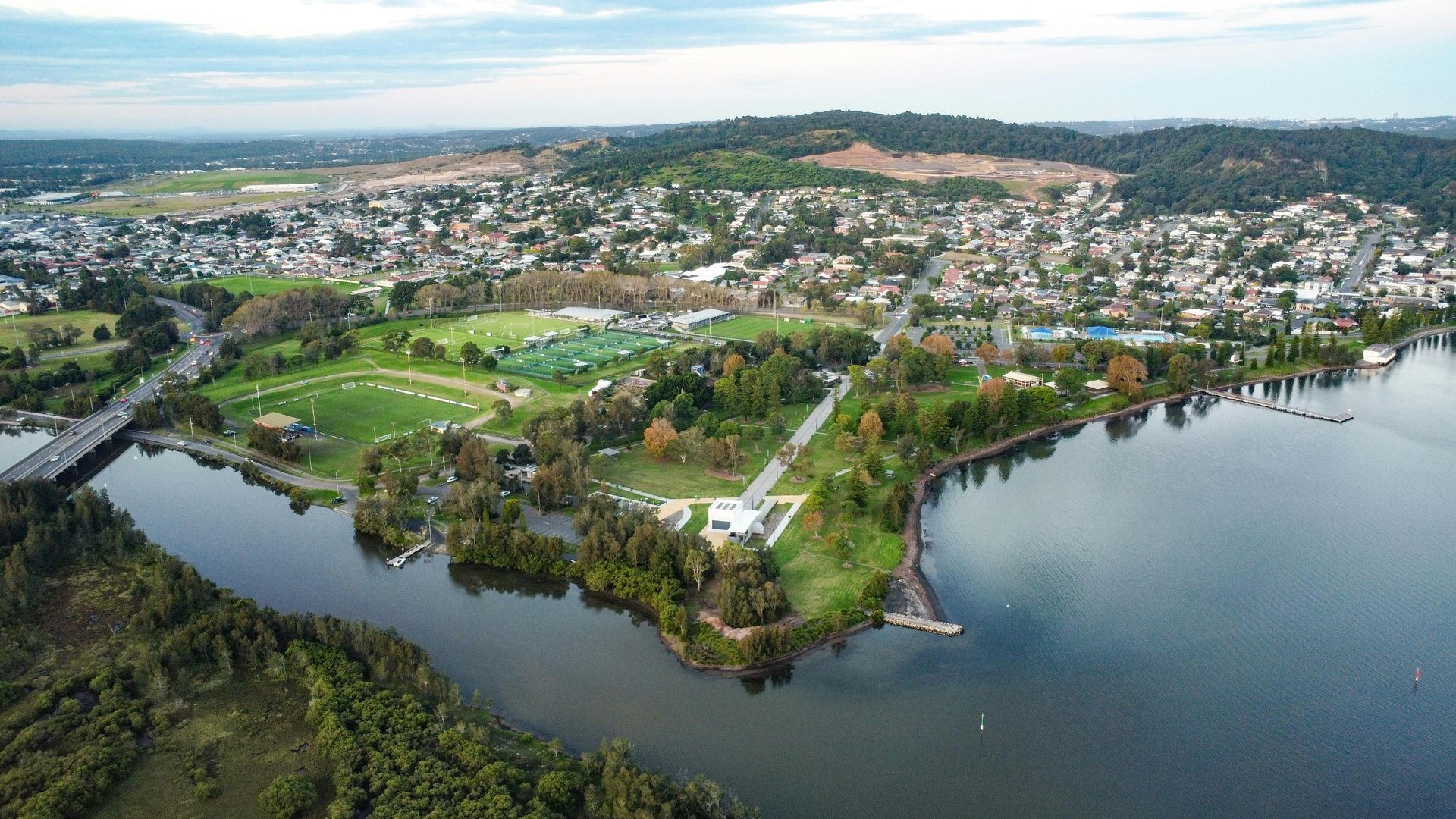 Aerial View of A Lakeside Town with Green Fields — MJ's Mobile Car Mechanic In Albion Park, NSW