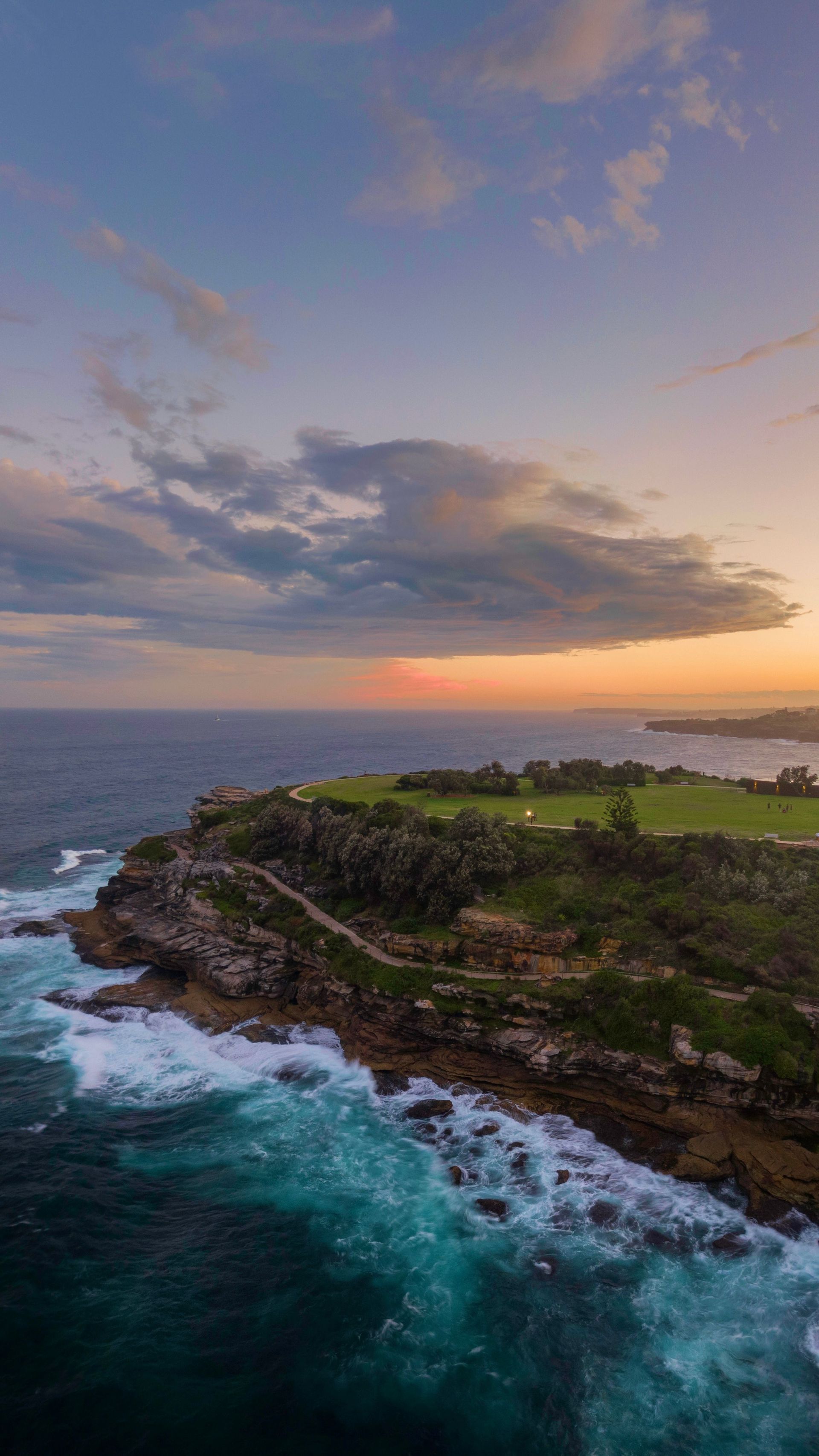 Rocky Coastline at Sunset with Turquoise Waves — MJ's Mobile Car Mechanic In Austinmer, NSW