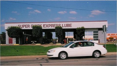 Mechanic Repairing Under the Car — Oklahoma City, OK — Super Quick Express Lube