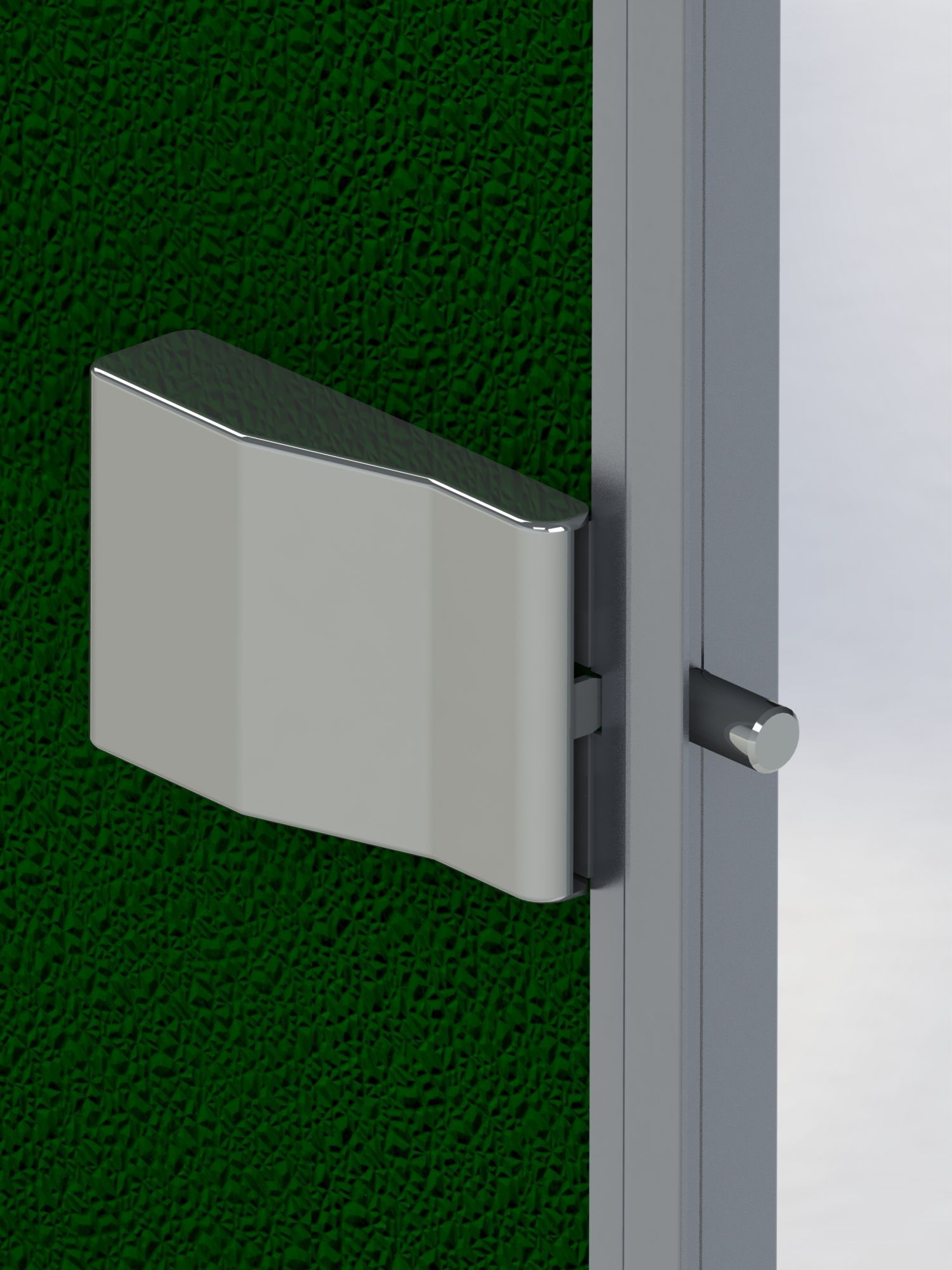 A close up of a door handle on a green wall.