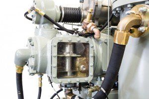 A close up of a machine with a hose attached to it.