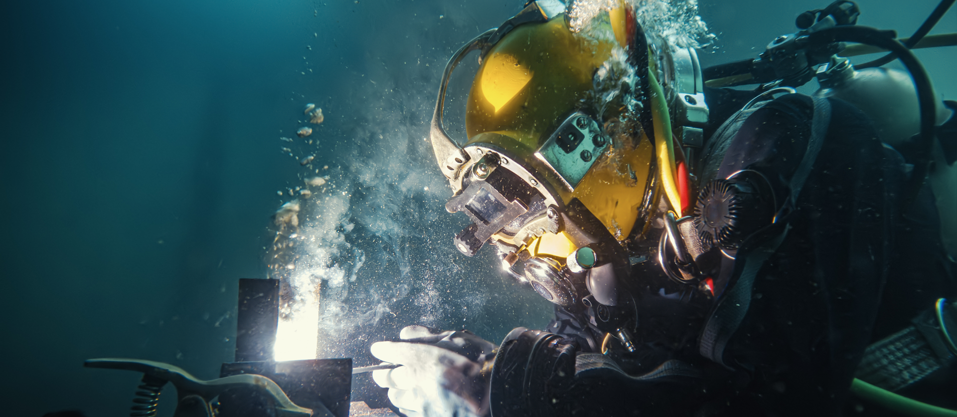 Scuba Diver welding underwater