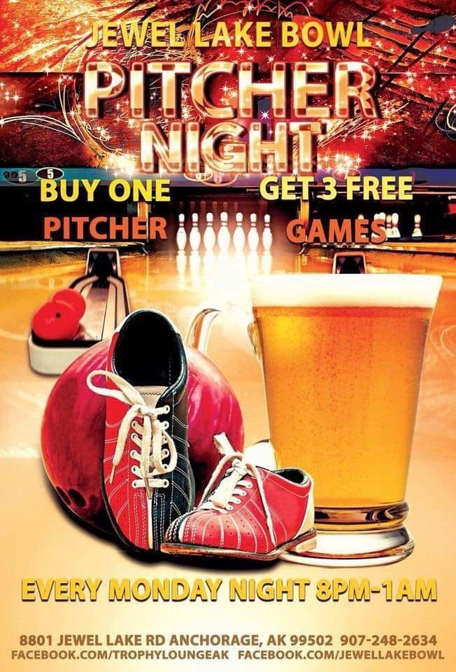 A person is playing bowling in a bowling alley. A person is playing bowling in a bowling alley.