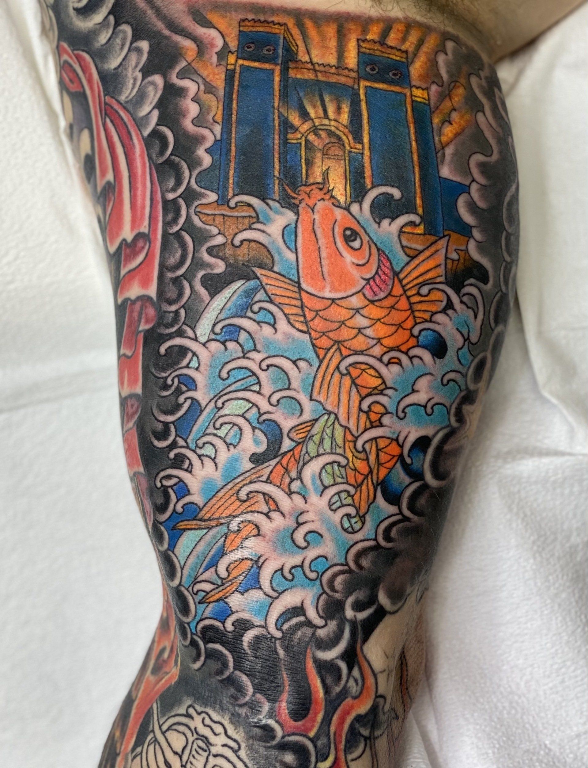 Orange fish — Little Rock, AR — Seventh Street Tattoos & Piercing