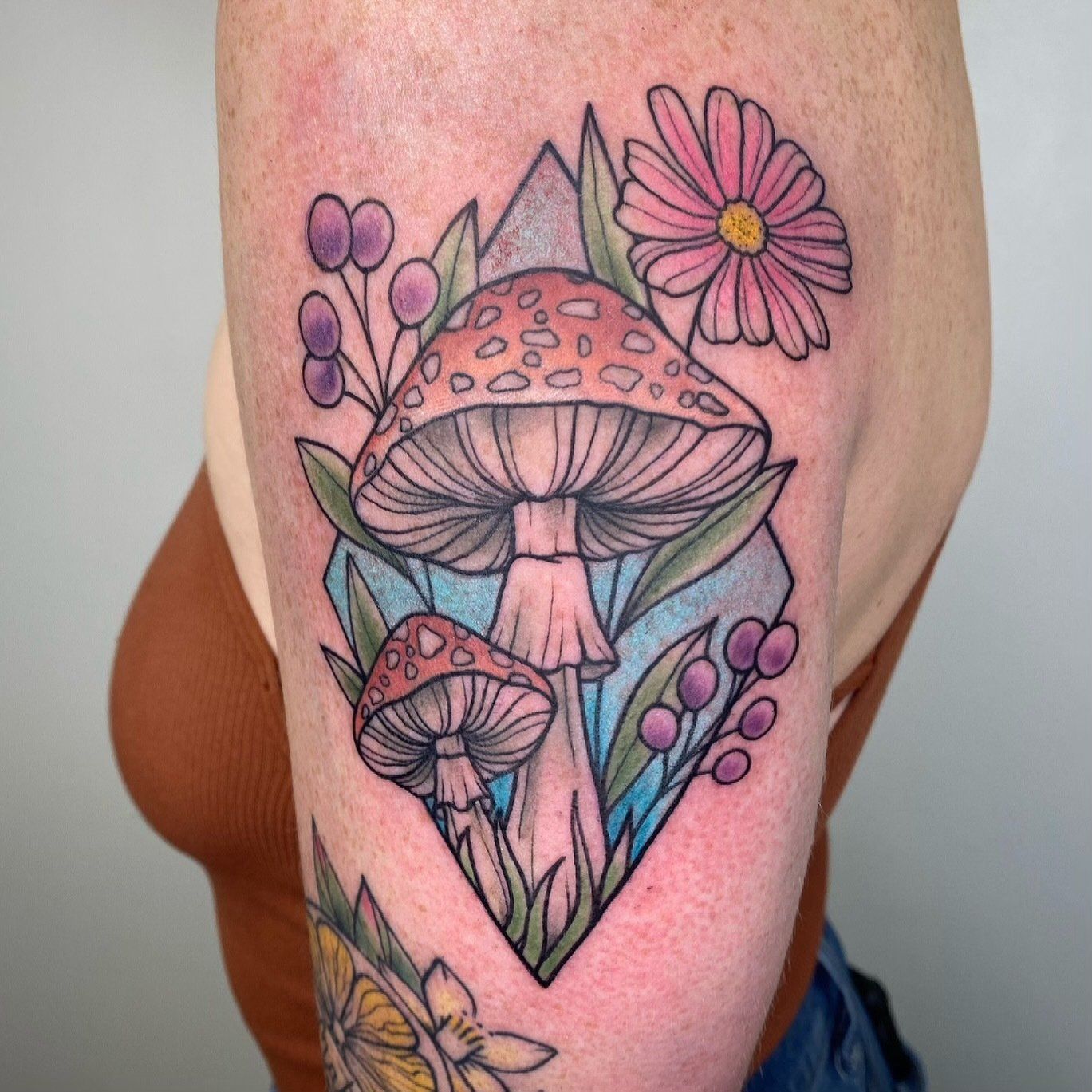 Mushroom with some flowers — Little Rock, AR — Seventh Street Tattoos & Piercing