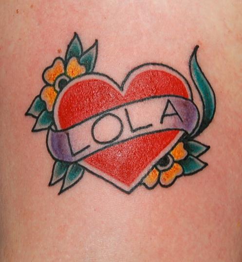 Heart with lola over it next to flowers tattoo — Little Rock, AR — Seventh Street Tattoos & Piercing