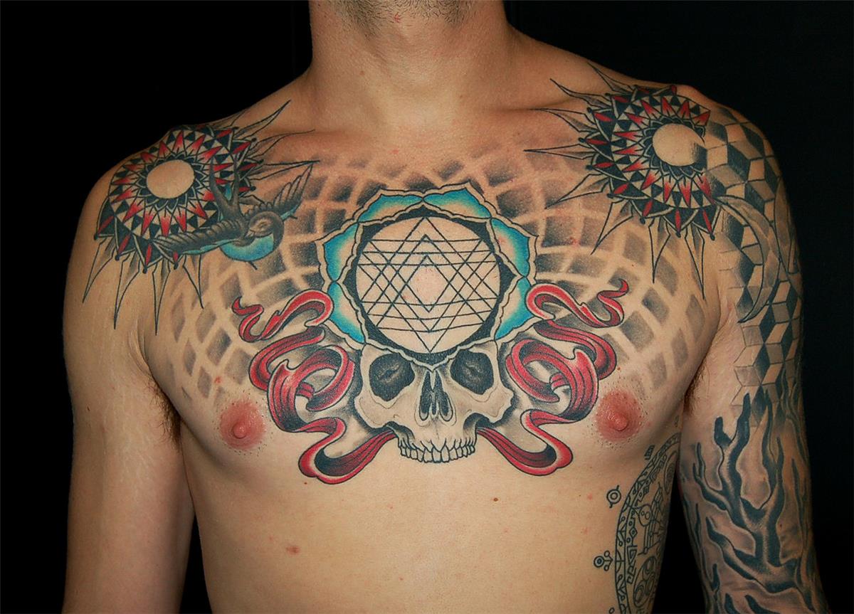 Skull and bird chest tattoo — Little Rock, AR — Seventh Street Tattoos & Piercing