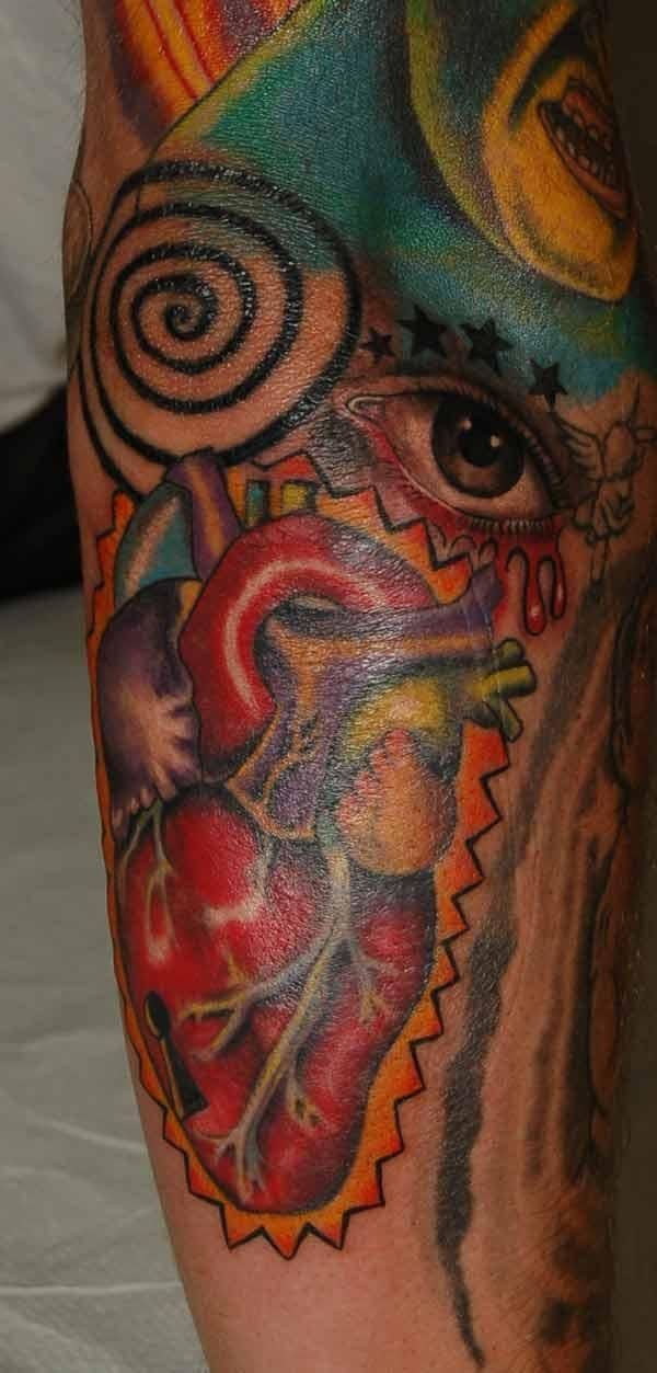 Heart with eye and spiral tattoo — Little Rock, AR — Seventh Street Tattoos & Piercing