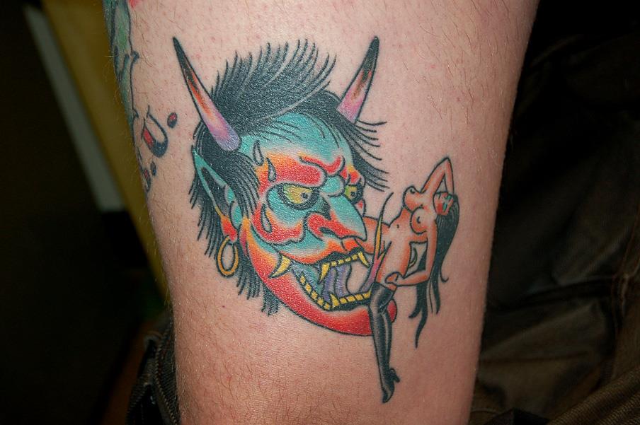 Oni head and woman tattoo — Little Rock, AR — Seventh Street Tattoos & Piercing