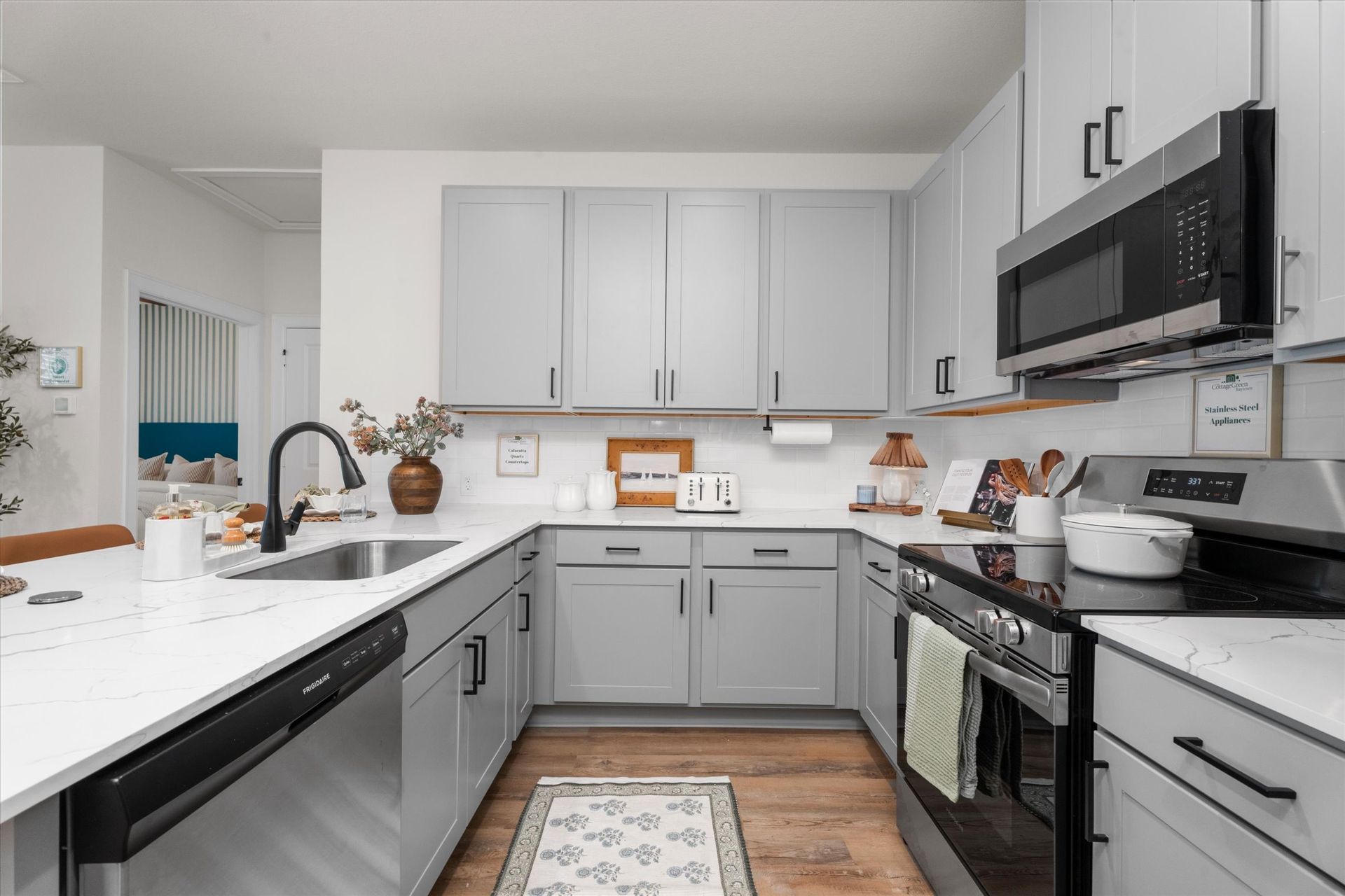 Modern kitchen with white cabinets in Baytown TX rental home