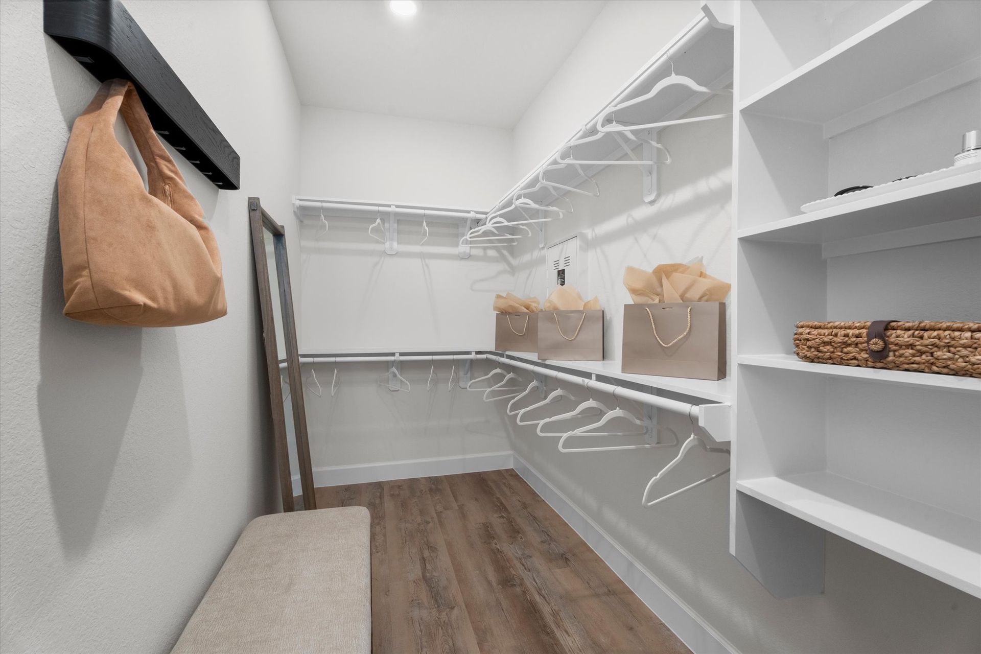 Walk-in closet with shelving in Baytown TX home
