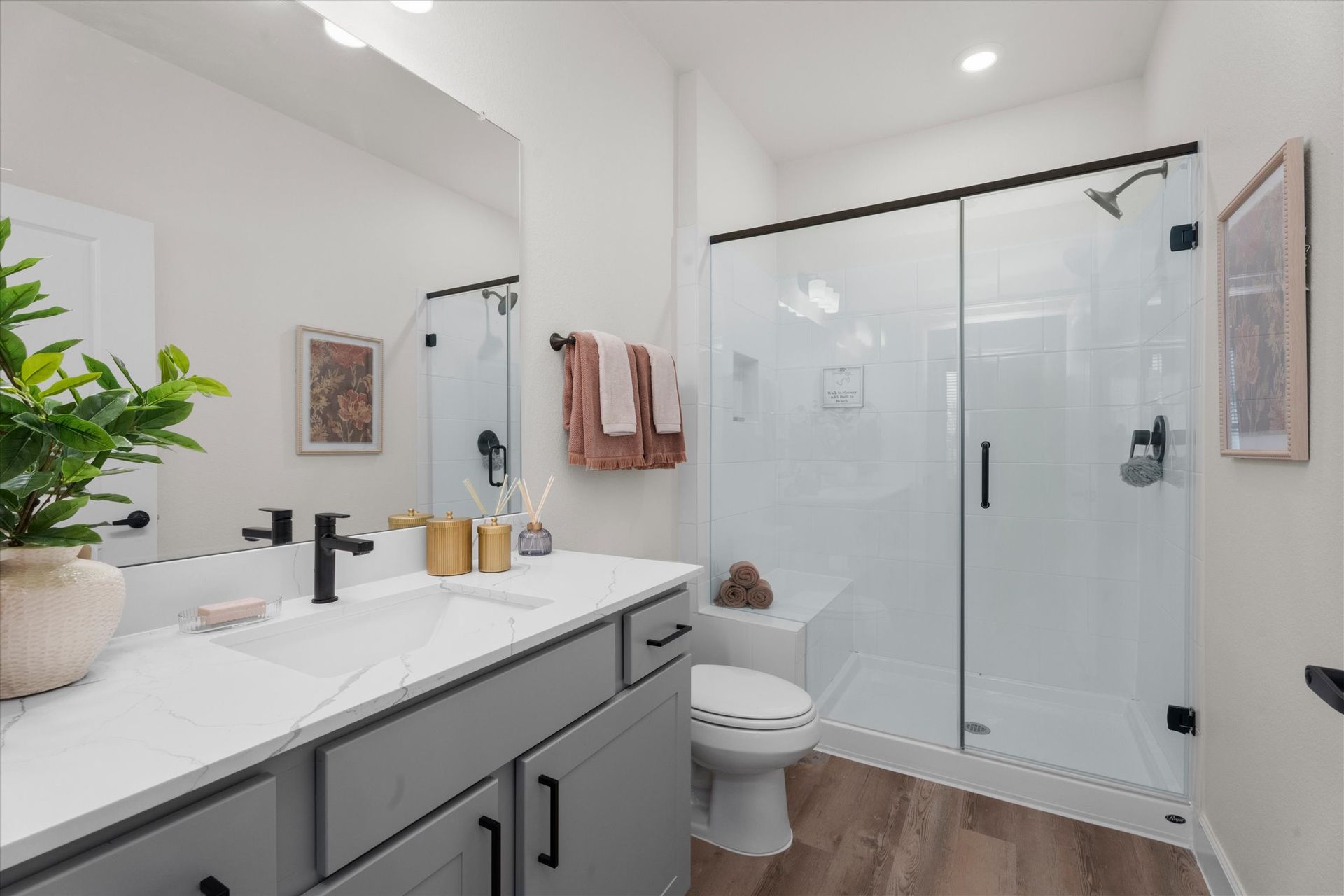 Modern bathroom with walk-in shower in Baytown TX home