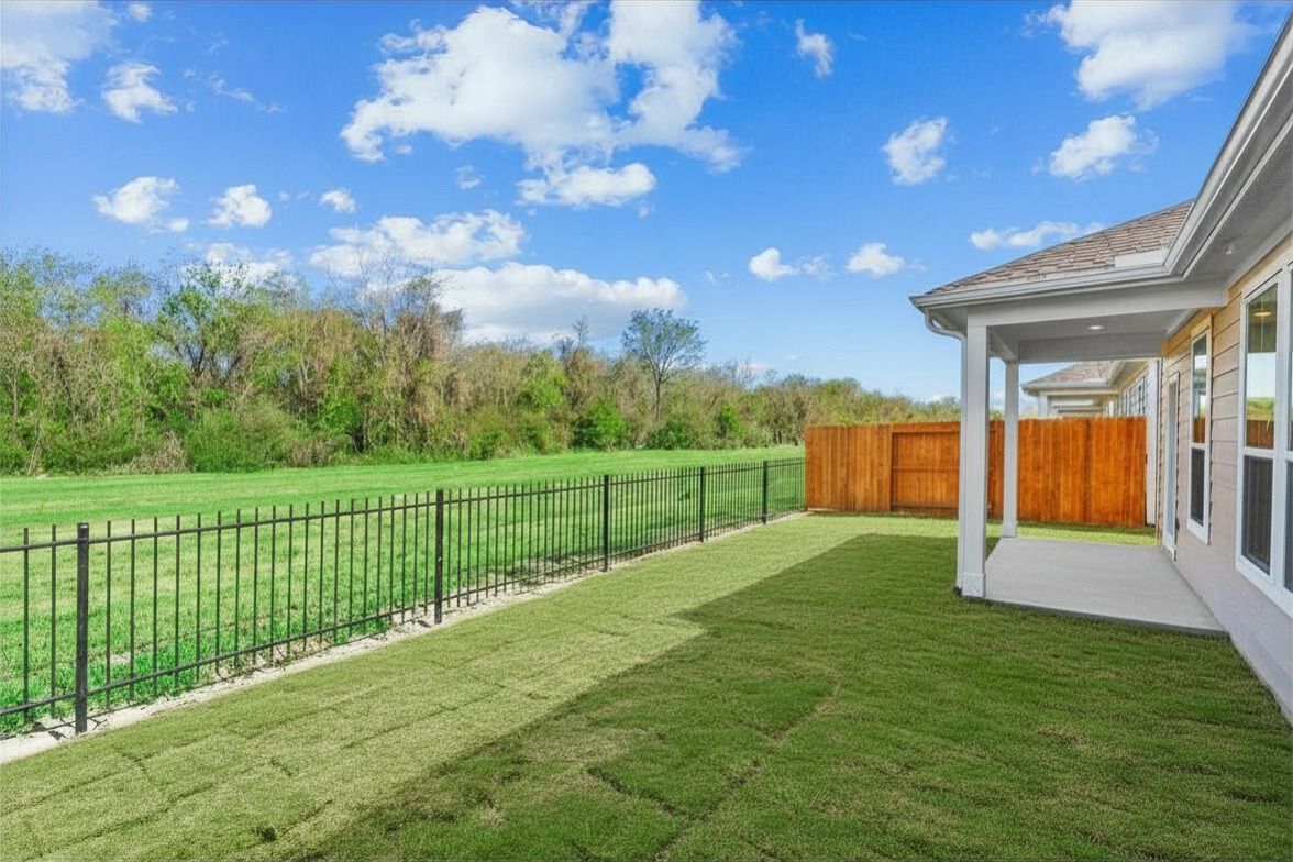 Private fenced backyard at cottage-style home in Baytown TX