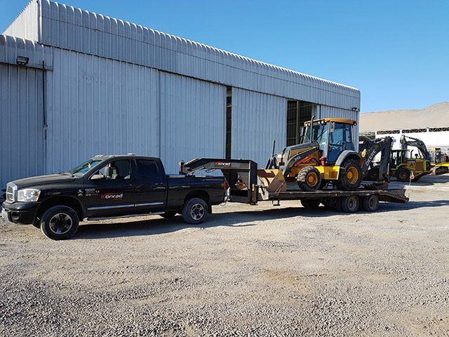 Konrad Towing - Grúas y transporte de carga