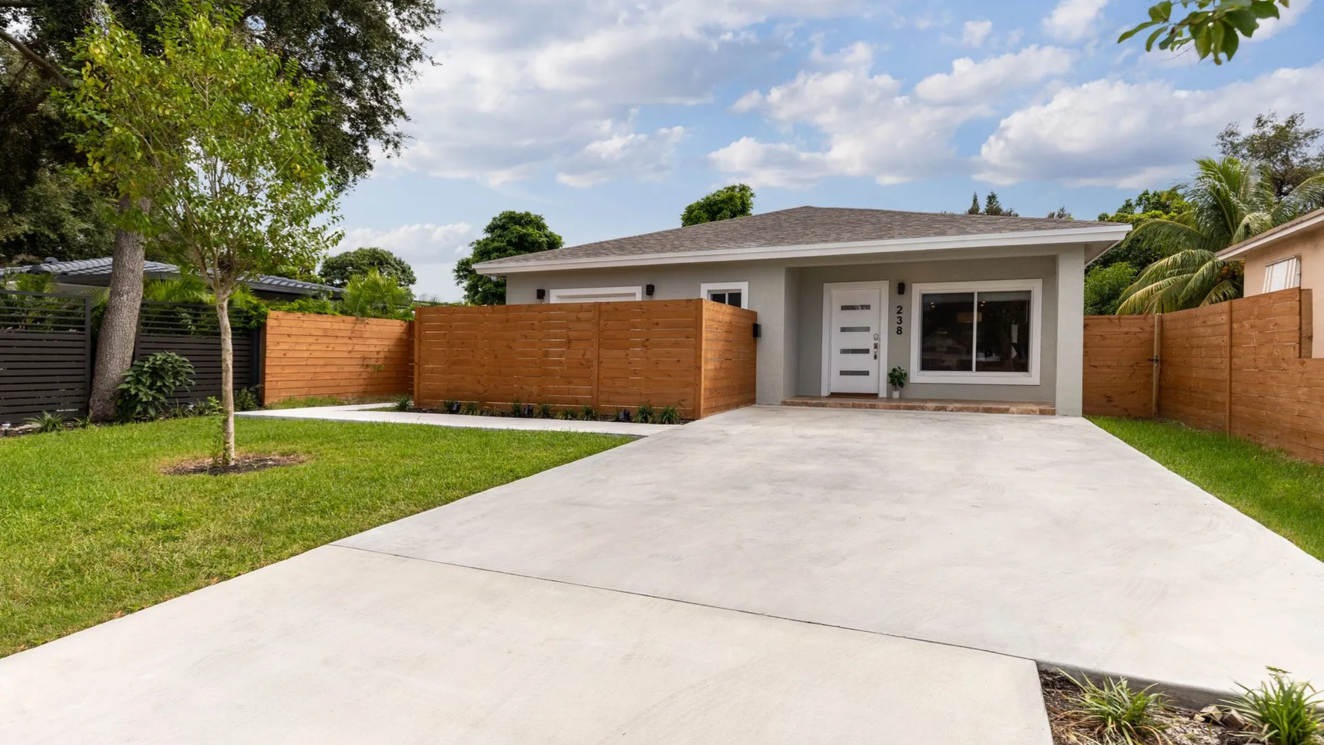 Clean residential concrete driveway installed for a Texas home