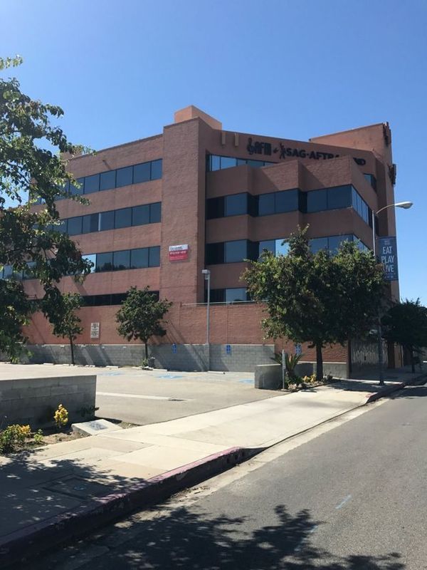 A large brick building with the word ucla on it