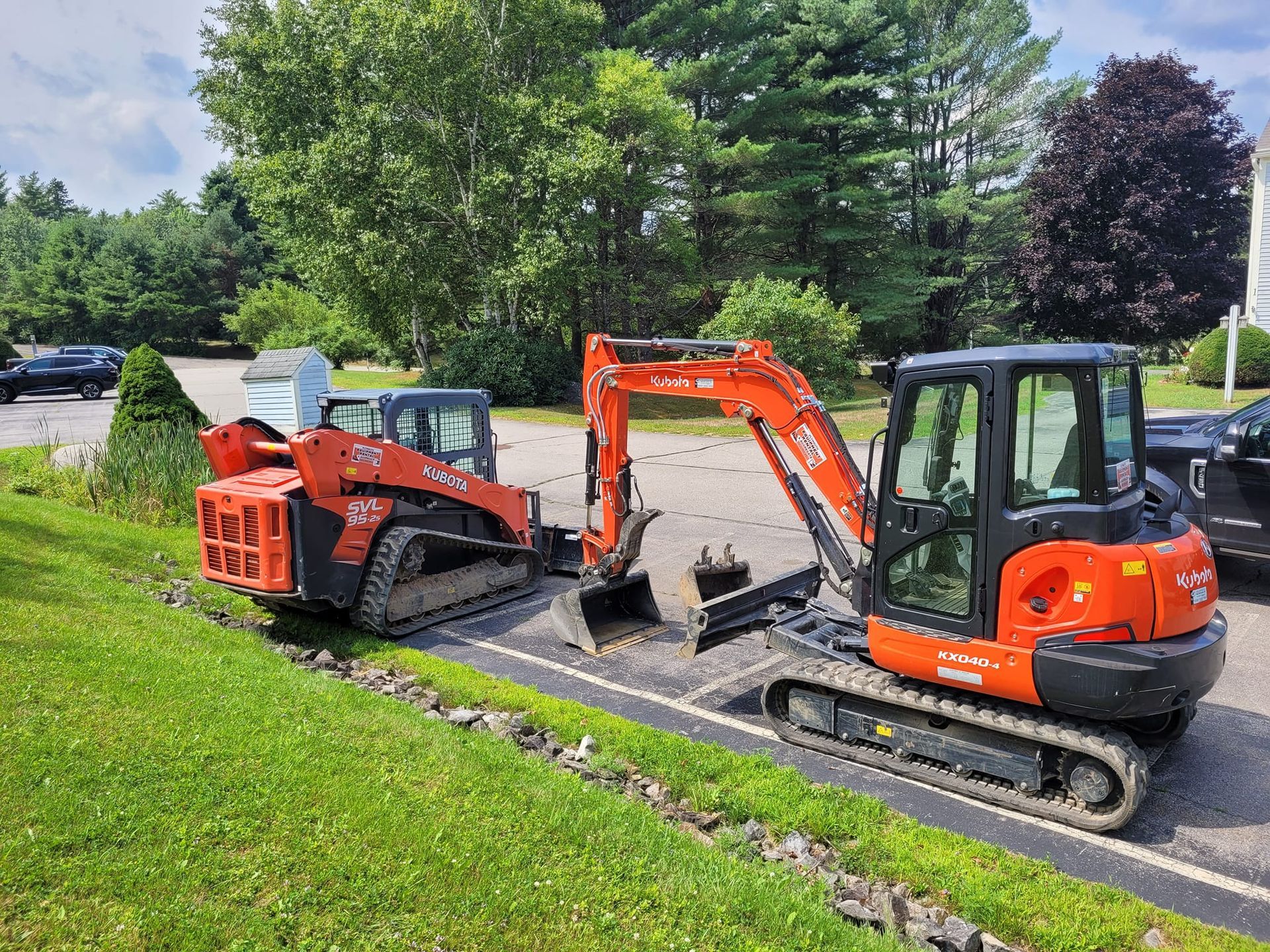 A close up of a shovel with a shadow on the ground.