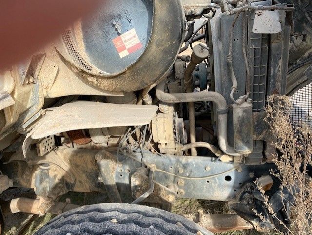 A close up of the engine of a truck.