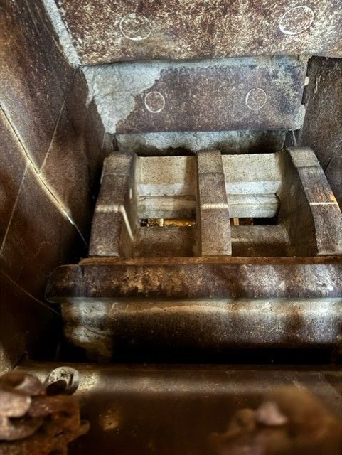 A close up of a metal object in a room.