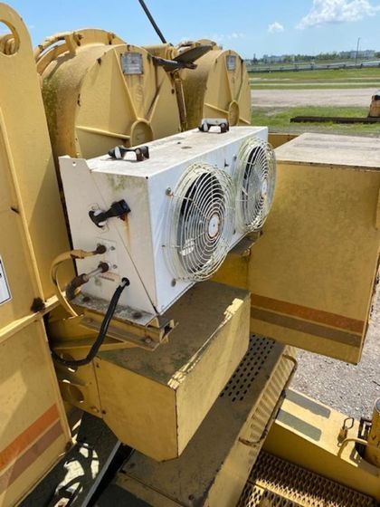 A close up of a machine with two fans on it