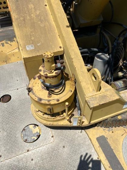 A close up of a machine with a shadow on the ground