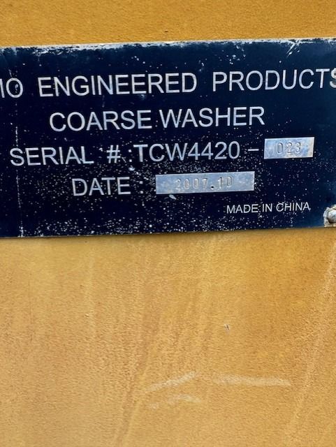 A sign that says 10 engineered products coarse washer serial # tcw4420 made in china