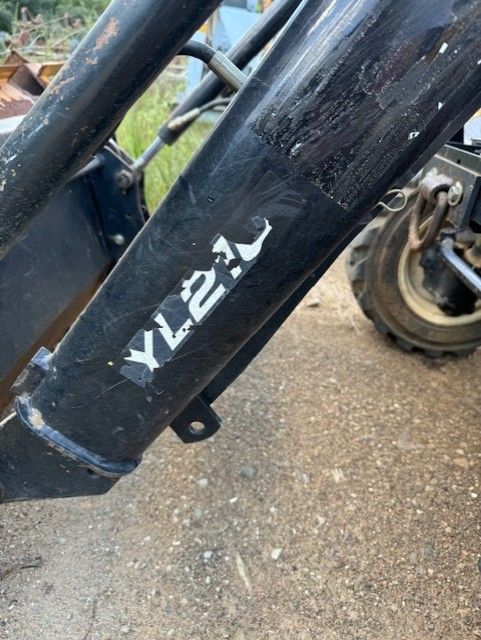 A black cylinder with the word yield written on it