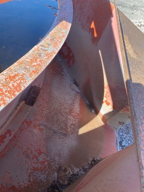 A close up of a metal object with the number 1 on it.