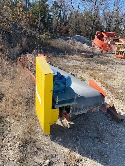 A conveyor belt with a motor attached to it