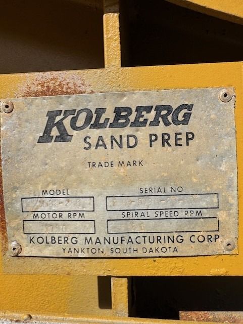 A close up of a kolberg sand prep label