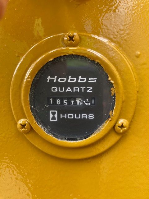 A close up of a hobbs quartz hour meter