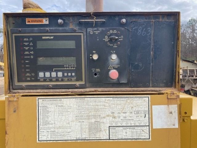 A close up of a control panel on a machine.