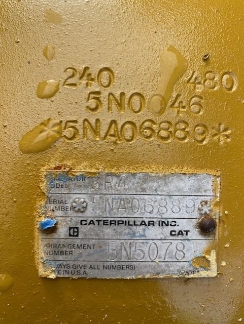 A close up of a cat label on a yellow surface.
