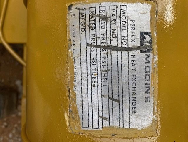 A label on a machine that says modine perfex heat exchanger