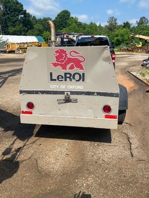 A lerol trailer is parked in a parking lot