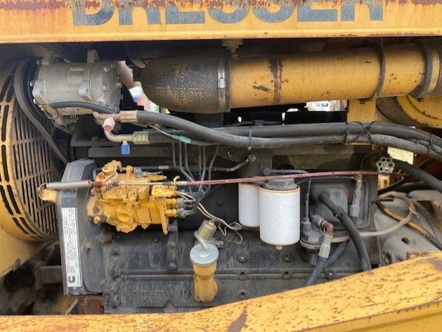 A close up of the engine of a discovery tractor
