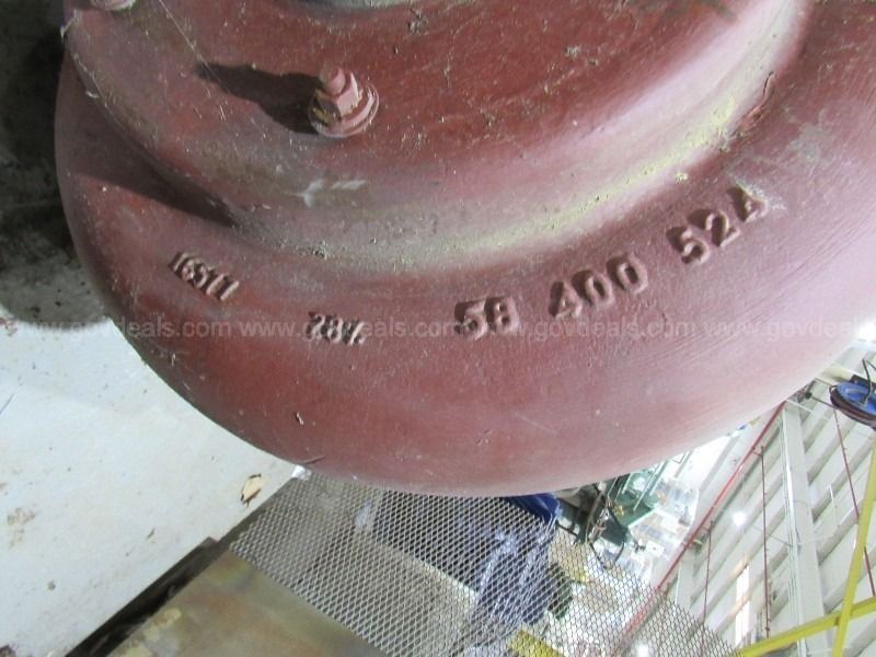 A close up of a red object with the number 58 400 524 on it
