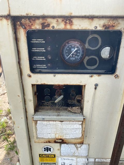 A close up of a machine with a gauge on it
