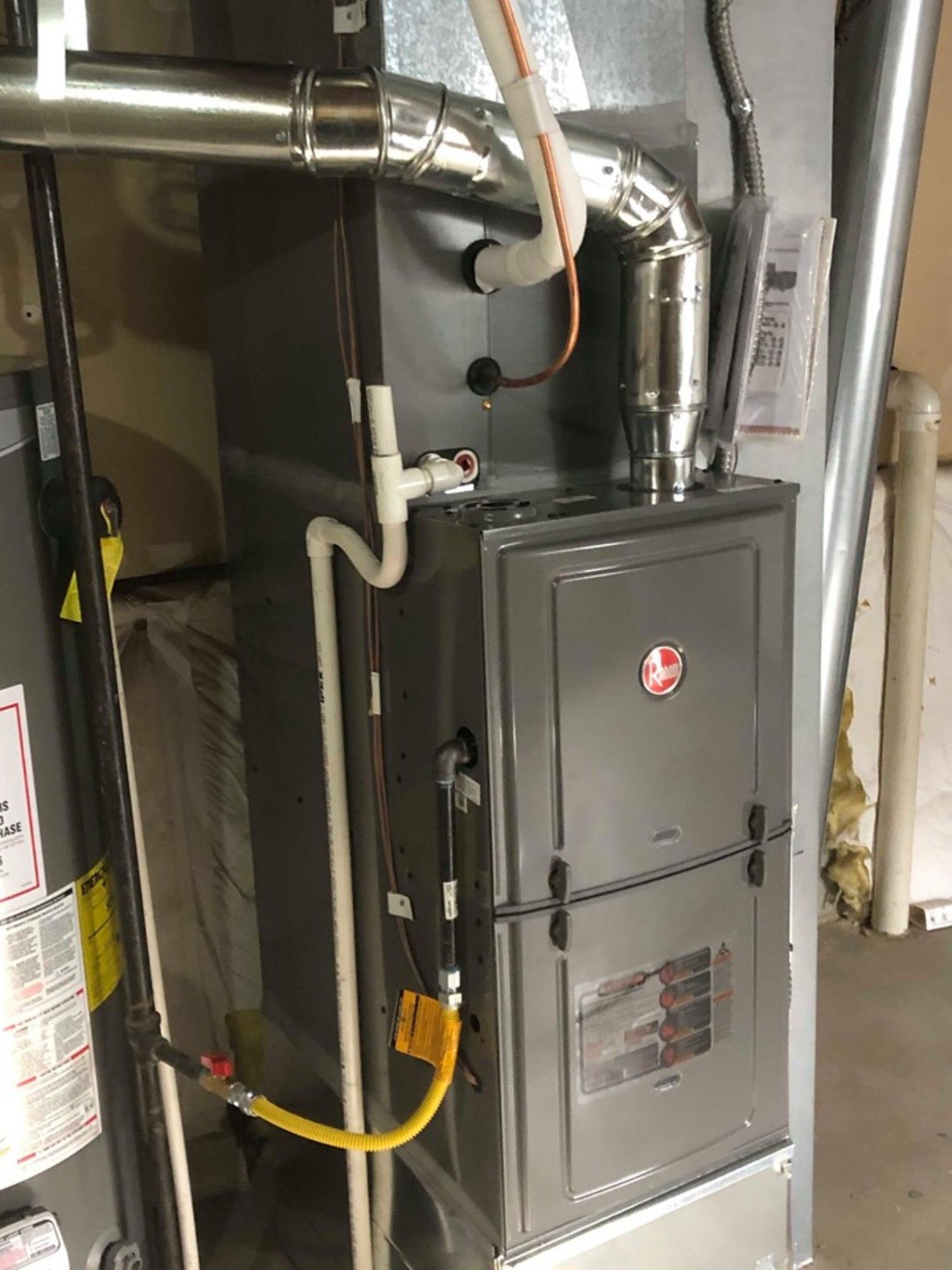 Gas furnace with ventilation pipes