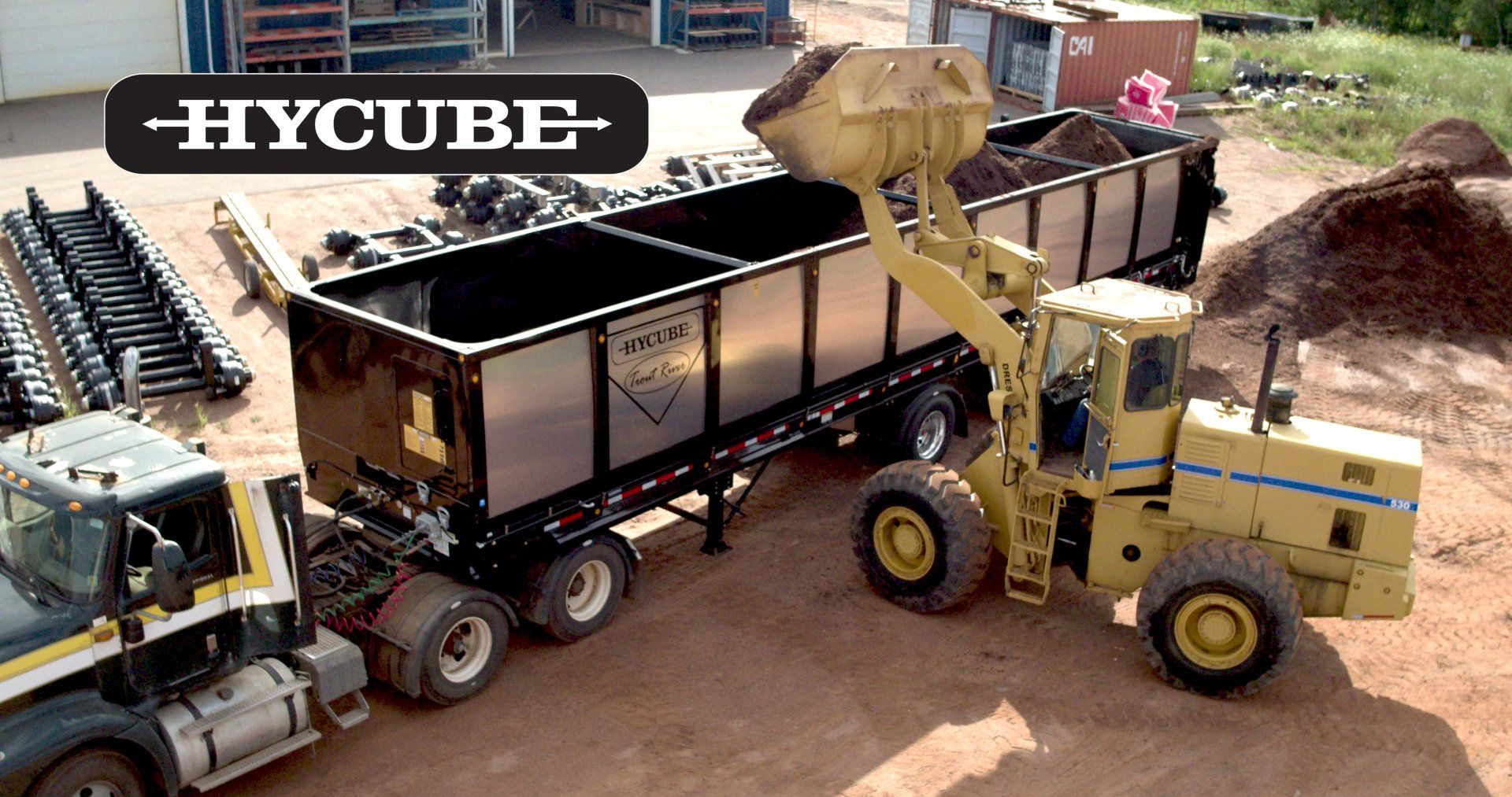 Trout River Industries Hycube trailer being loaded