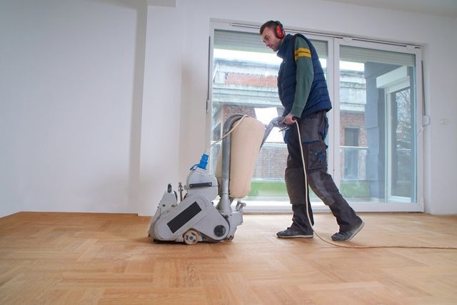 Man Sanding the Floor — Pacific Flooring in Bonville, NSW