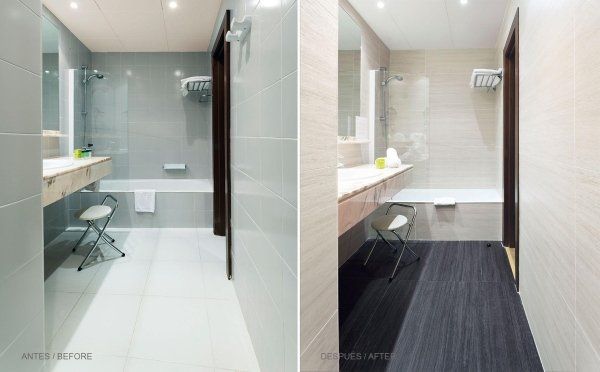 vista frontale di bagni moderni con vasca e arredo bagno