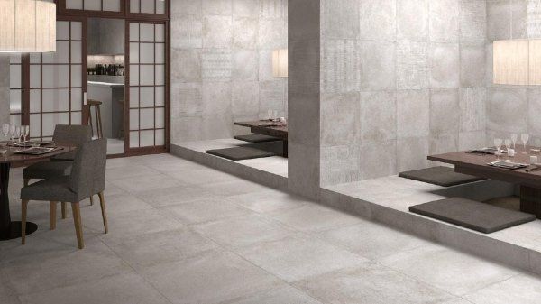 vista interna di un sala da pranzo moderno con parete e pavimento in marmo
