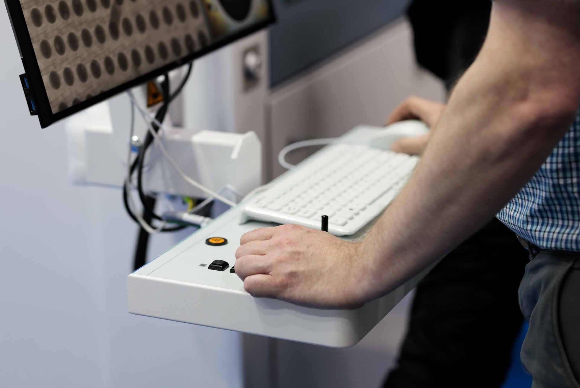 PCB engineer working on Sub-Micron X-Ray Inspection