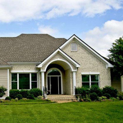 House With Green Lawn