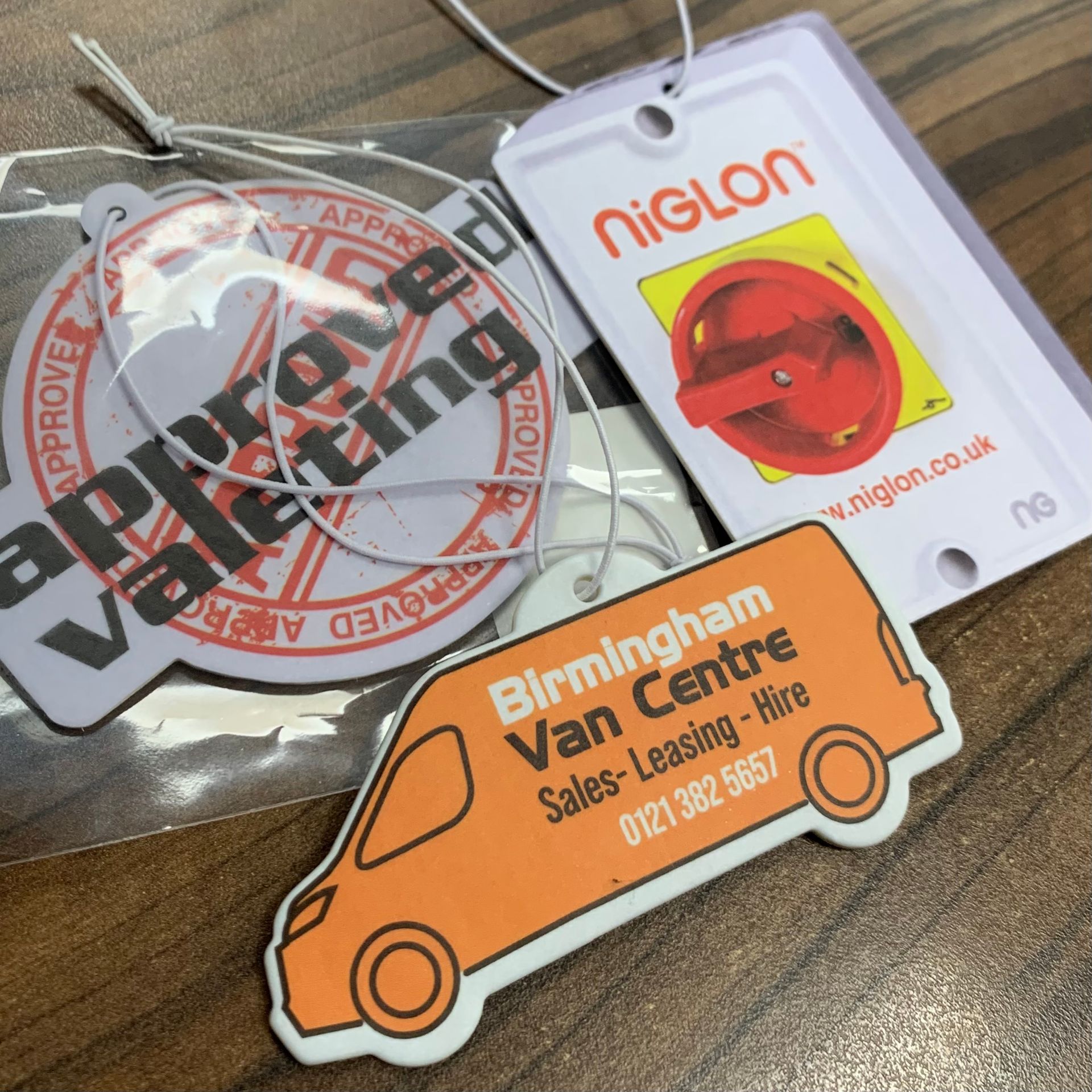 WhiteLodge Various branded promotional tags.