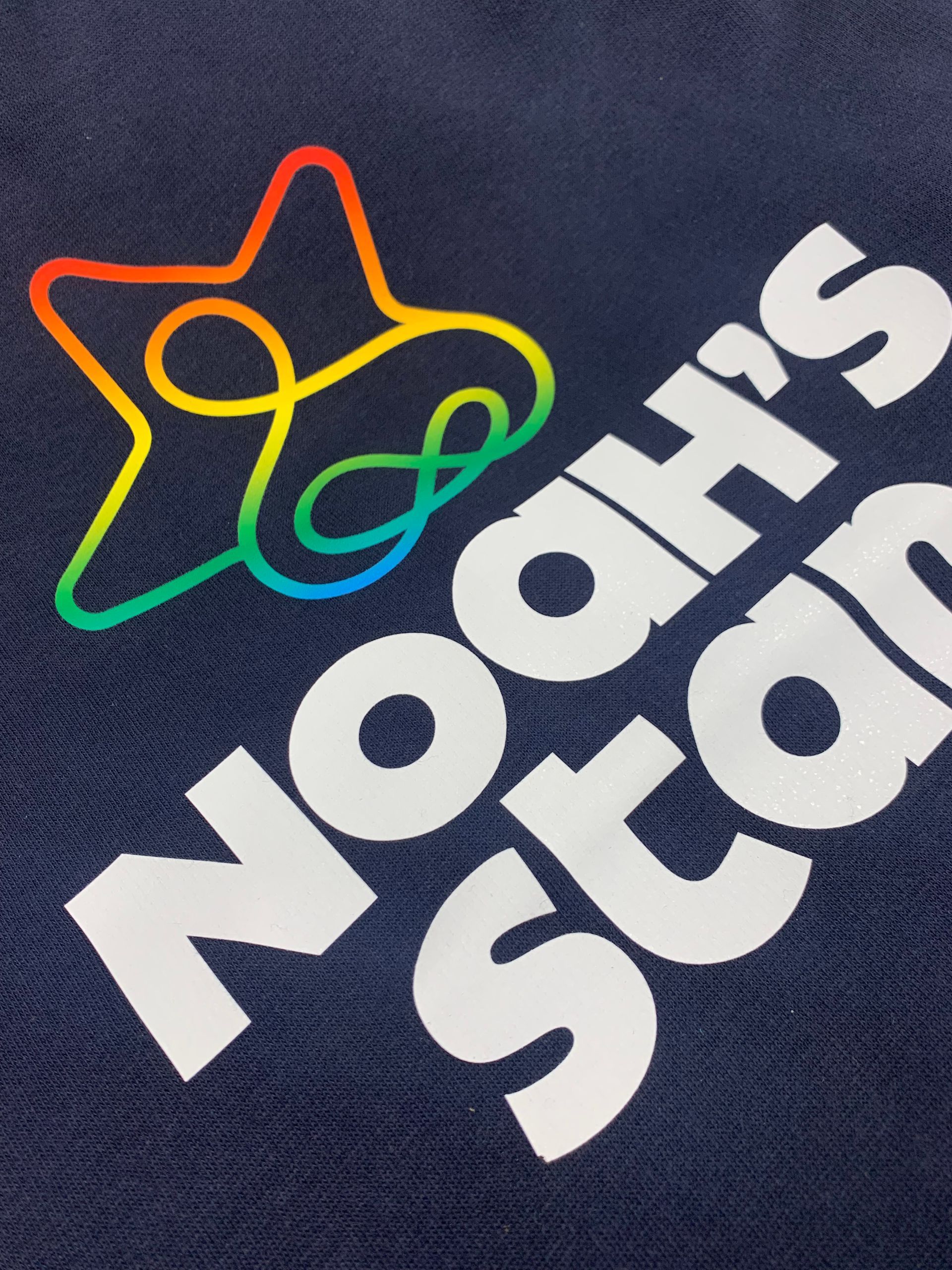 WhiteLodge Navy blue t-shirt with rainbow star logo and