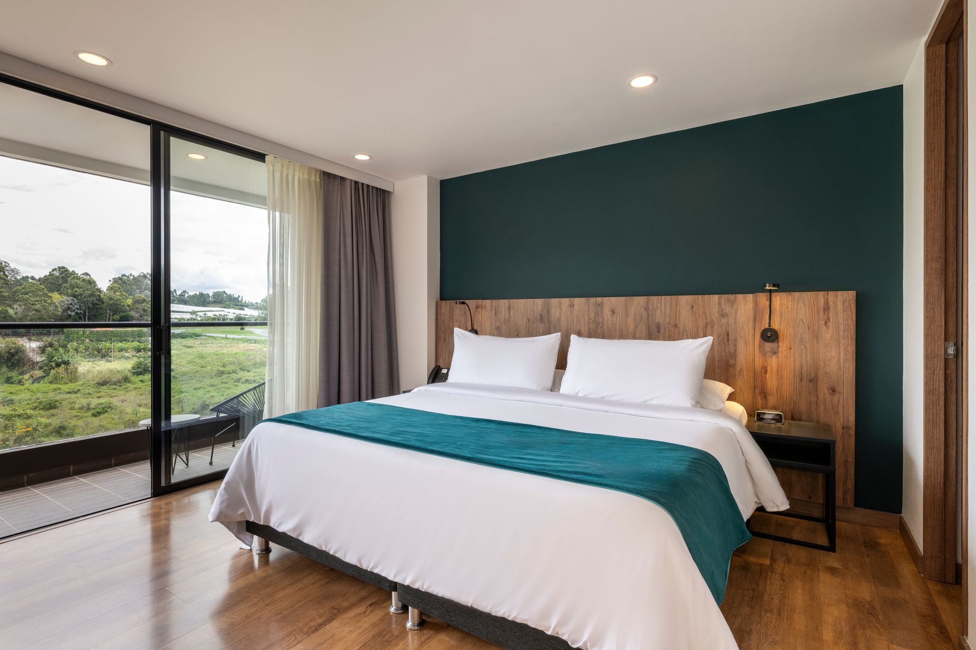 vista de cama habitación Junior suite, Hotel Lagoon Llanogrande